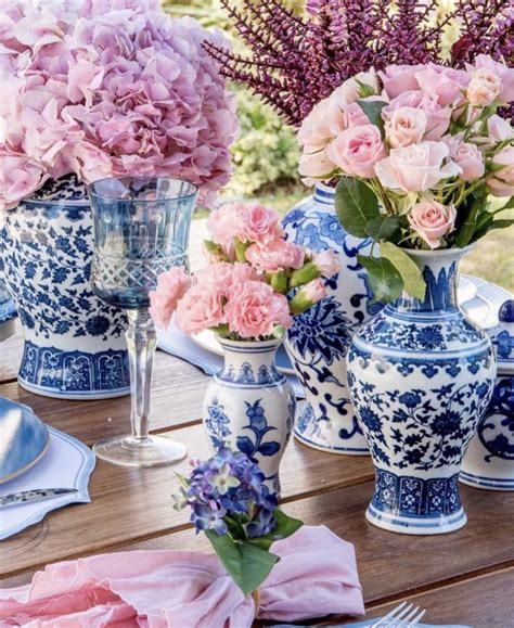 blue and white vases with a variety of pink flowers is hard to mess up