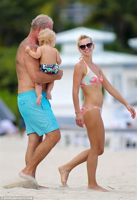 Kelsey Grammer Carries Son With Wife Kayte Walsh On Miami Beach
