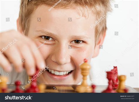 Teenage Boy Playing Chess Smiling Stock Photo 568821877 Shutterstock