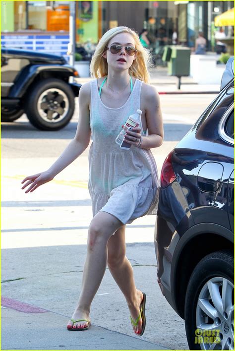 Full Sized Photo Of Elle Fanning Shows Bright Bikini In Sheer Dress 09 Photo 2905228 Just Jared