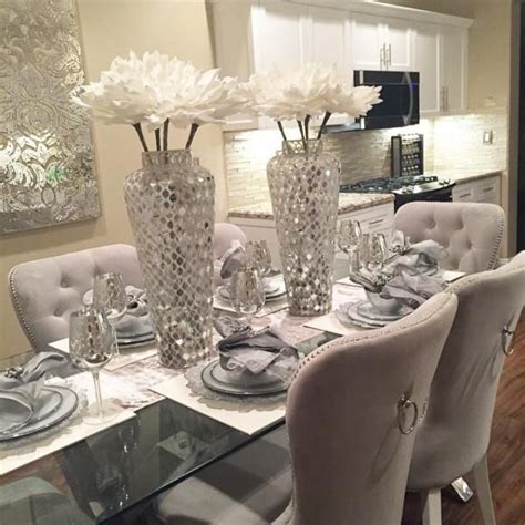 Dining table (1) read more. I like the chairs. The place setting is pretty but the ...