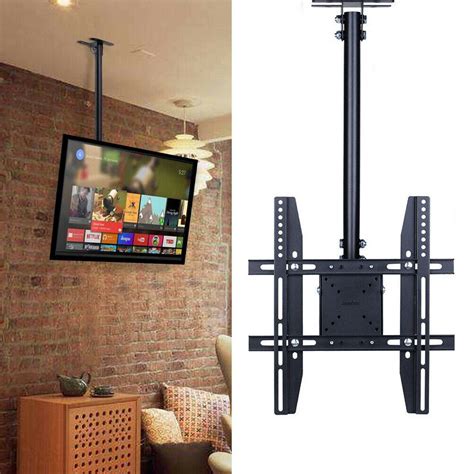 Prop the tv against the wall and measure the distance from the bottom of the tv to the center of each row of mounting holes on the back plate. Ceiling TV Mount Installation Toronto | LeslievilleGeek TV ...