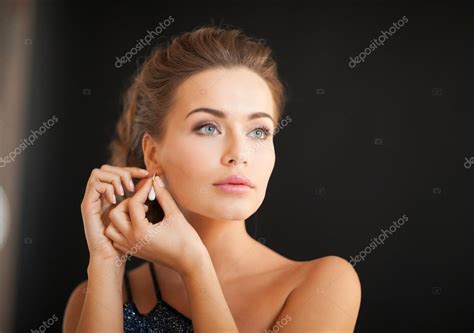 Woman With Diamond Earrings Stock Photo By ©sydaproductions 64755833