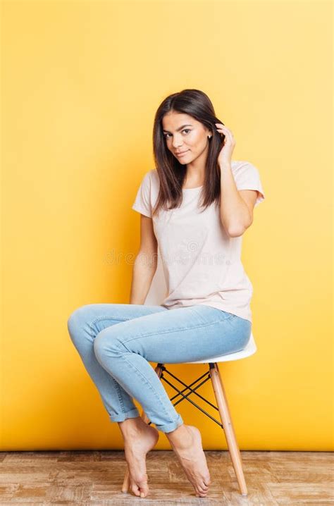 Pretty Young Woman Sitting On The Chair Stock Photo Image Of Cheerful