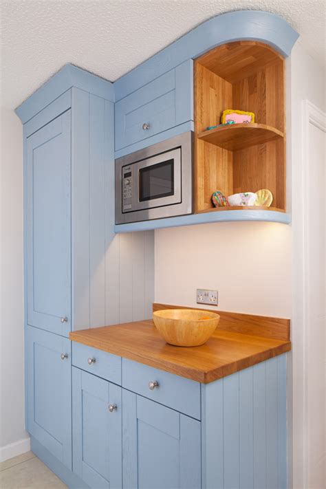 You can build a 2×4 base to set the slightly shorter base cabinet on top of, and then cover the front of the 2×4 base with wood. Tall Kitchen Larder Units & Storage Cabinets - Solid Wood ...