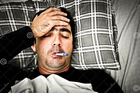 Dramatic Image Of A Sick Man In Bed With Fever Stock Image Image Of Healthcare Desaturated