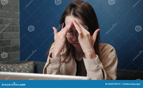 Sad Woman Working Laptop Computer At The Home An Unhappy Caucasian Woman Uses Laptop At Home