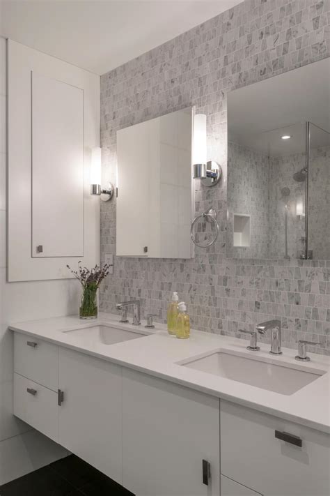 Crisp White Modern Bathroom With Mosaic Tile Accent Wall