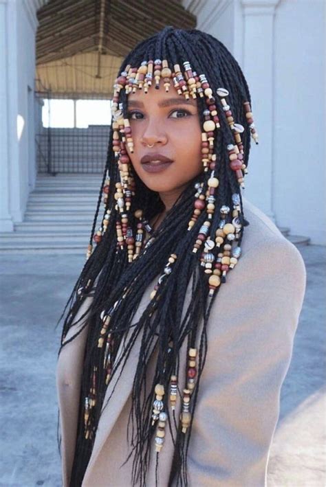 Historically, braids have held a lot of meaning with different styles and patterns reflecting a person's create a faux undercut effect by only braiding half of your hair and letting your natural curls shine. These Beaded Braid Hairstyles Will Leave You Mesmerized in ...