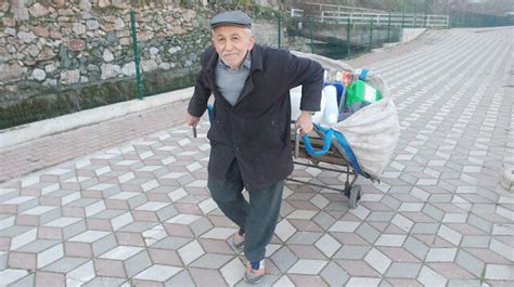 Turkish Grandpa Carries The Weight Of The World On His Shoulders To