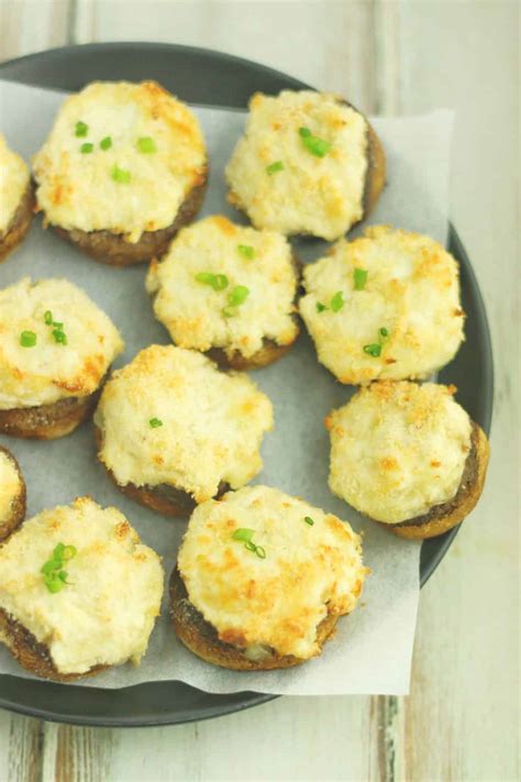 This is a simple recipe for mushrooms stuffed with crab and cream cheese, then sprinkled with a parmesan topping. Keto Crab Stuffed Mushrooms - Officially Gluten Free