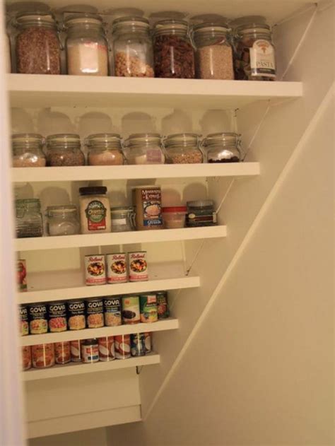 Great ways exploit space under stairs. Under the stairs spice rack made simply from angled ...