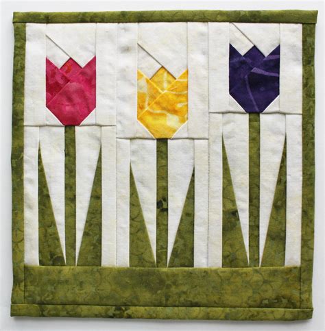 If you are creating spring flowers, then use these flower patterns to color and then use these as spring flowers cut outs. Jen Daly Quilts: Spring, Really?