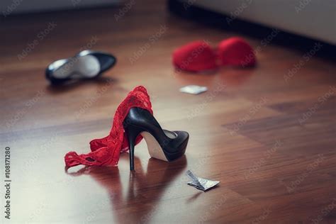 Bedroom Mess With Lingerie Shoes And Condom Quick Sex Concept Stock