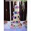 Four Tier With Silk Flowers $695 • Temptation Cakes 
