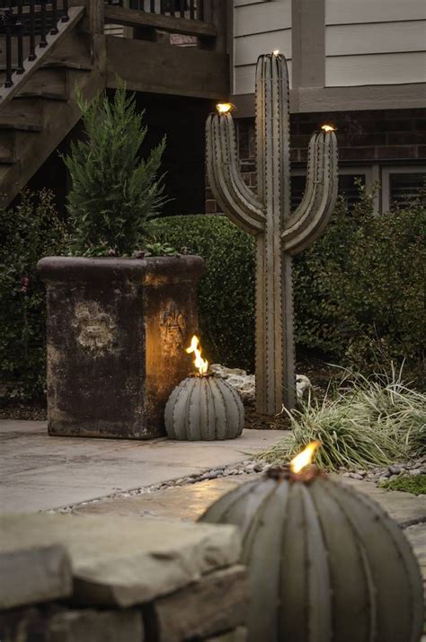 Mix 3 parts of commercial potting compost with 1 part of grit (not sand) and 1 part of perlite. Saguaro cactus garden torch | Metal structure, Texas ranch ...