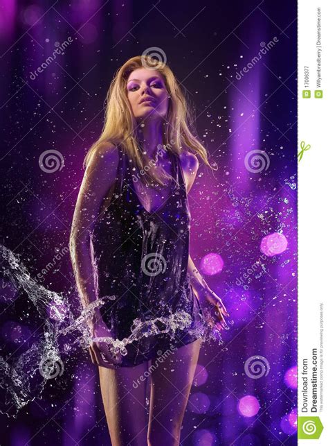 Beautiful Girl Purple Background And Water Royalty Free