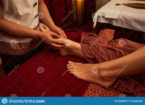 Experienced Podologist Giving Massage To Client In Salon Stock Image