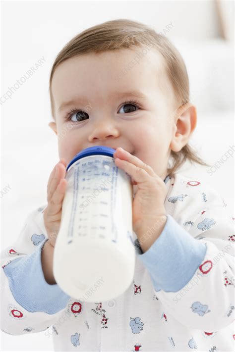 Baby Girl Drinking Milk Stock Image F0035490 Science Photo Library