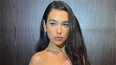 Dua Lipa Wore A See Through Fishnet Dress With A Pink Thong And Patrick