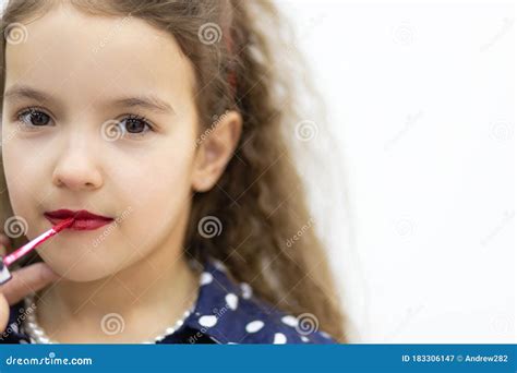 Beautiful Young Girl Putting On Red Lipstick Stock Image Image Of