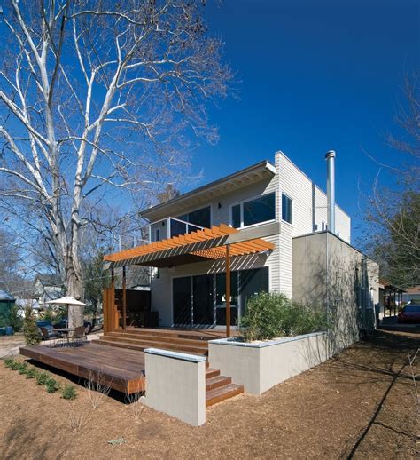 The house is a three storeyed atrium with glass panes for letting natural light in.the ground, first, and second floor have the living room, bedrooms, dining area, etc. Photo 2 of 30 in Triangle House Tours | Triangle house, House, House tours