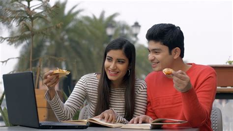 Attractive Indian Couple Spending College Time Together In A C