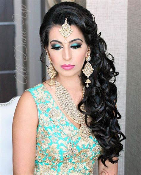 Wedding reception hairstyles for curly hair | hairstyles image source : Gorgeous Kundan Jewelry paired with a bright teal lehenga ...