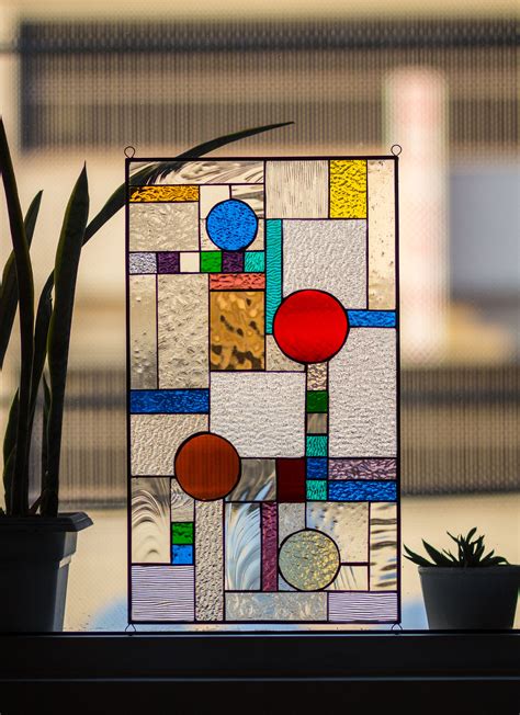 Although mainly known as an architect, frank lloyd wright was also active in many related areas as well, including furniture design, graphics arts, and my favorite — his work with stained glass. Stained Glass Tiffany Window Frank Lloyd Wright Abstract ...