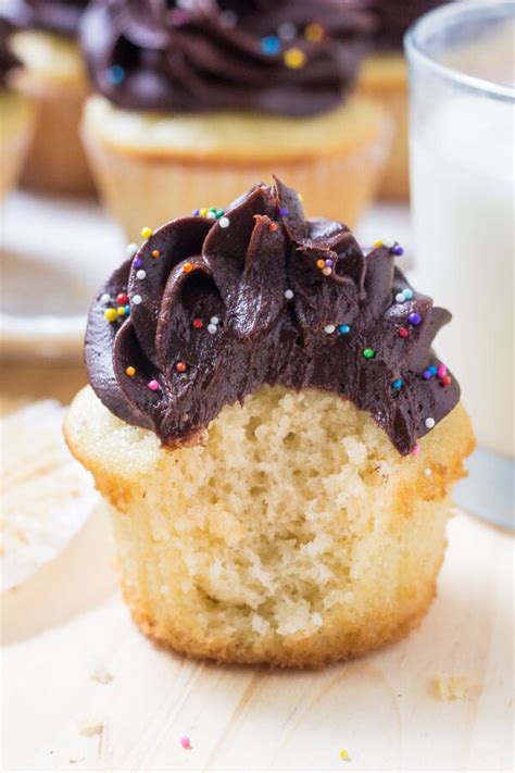 Vanilla Cupcakes With Chocolate Frosting Just So Tasty