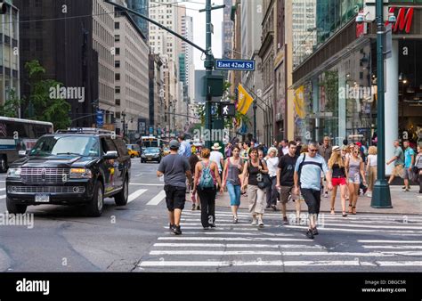 Manhattan Street Scene People Walking Across A Downtown Sidewalk