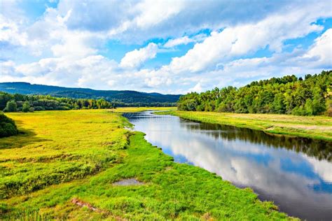 Beautiful Natural River Landscape With Forest And Hills Stock Photo