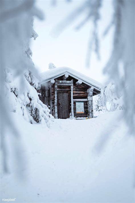 Wooden Cabin In A Snowy Forest In Finland Free Image By