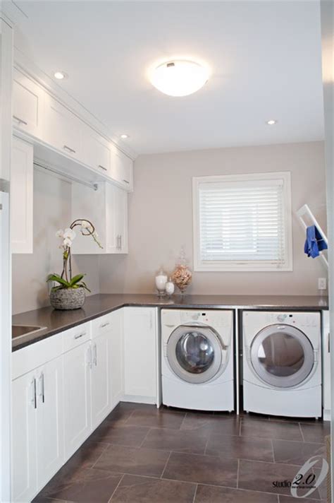 I'd like to finish it with some studs and drywall so i can clean up the area, put down tile and some shelving. Laundry Room Design - Contemporary - Laundry Room - other ...