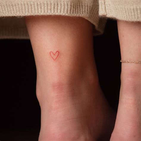 Minimalist Red Heart Tattoo