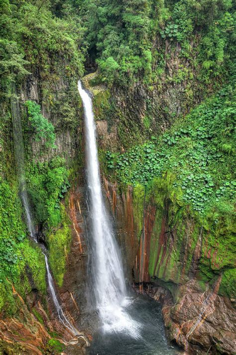 Tropical Waterfall In Volcanic Crater Art Print By Ogphoto