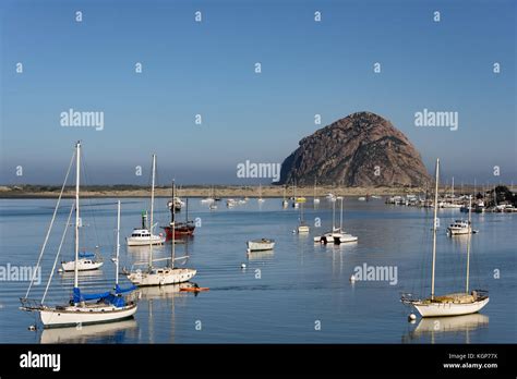 View Of Morro Rock Across Morro Bay With Sail Boats Anchored Across