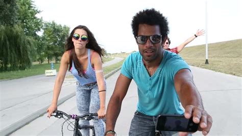 Three Young Adults Having Fun Cycling And Taking Selfies Stock Footage Video Of Selfie