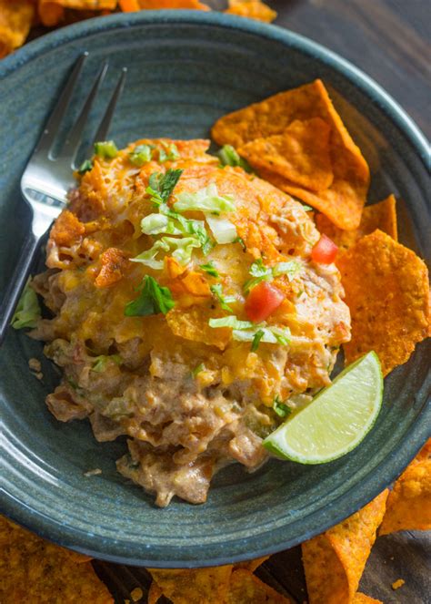 Crush dorito chips and place them on the bottom of your casserole dish and set aside. Doritos Chicken Casserole | Gimme Delicious