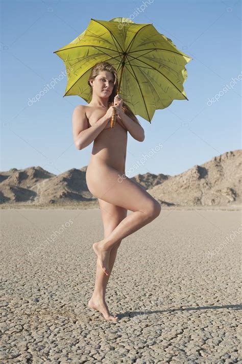 Naked Woman Holding Umbrella Stock Photo By Londondeposit