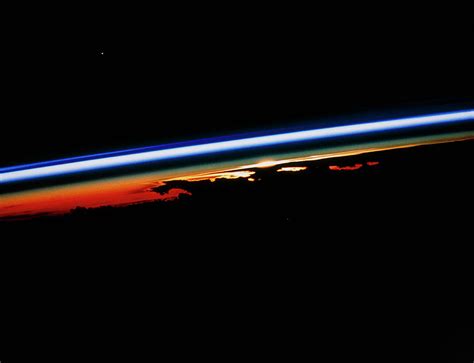 Sunset View Of Atmosphere Seen From Orbit Photograph By Nasascience