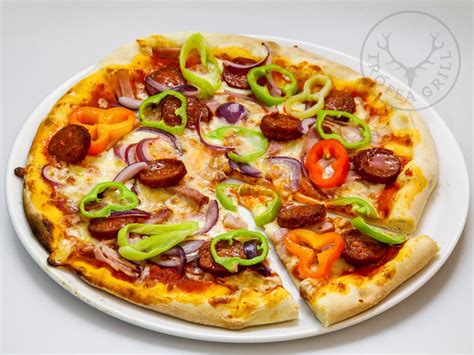Confirm how many slices are included with each size. Magyaros pizza - 26 cm