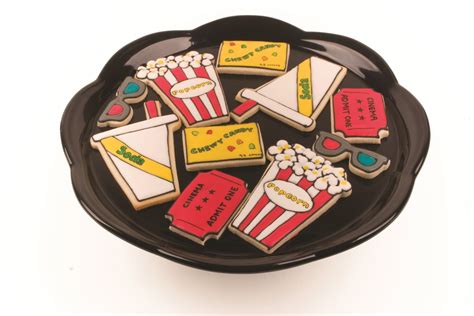 The most common movie theater themed material is cotton. Movie Theatre Cookies (With images) | Cookie decorating ...