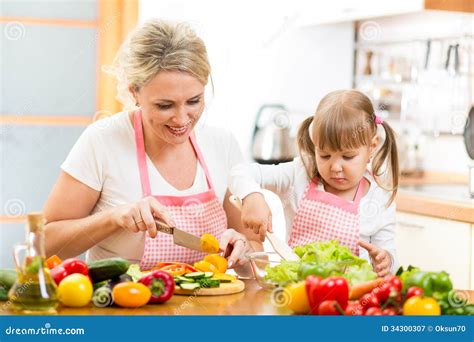 Mother And Kid Girl Preparing Healthy Food Stock Image Image Of Apron
