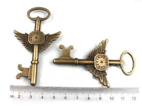 Patterns Of Time Antique Bronze Finish Steampunk Wing Key And Clock Retro