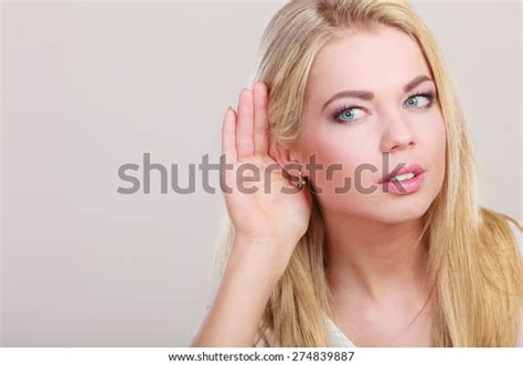 Female Hand Ear Listening On Gray Stock Photo 274839887 Shutterstock