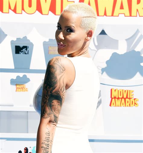 Allegedly, she's changed khalifa into slash. Amber Rose Covers Tattoo of Ex Wiz Khalifa With Another Man