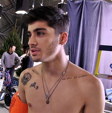 Gigi hadid looks ready to race in checkered top & bomber jacket in new york. Top 15 Zayn Malik Tattoos And Meanings That You Should ...