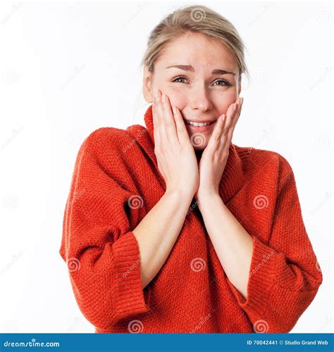 Thrilled Woman Touching Her Face For Wellbeing And Pleasure Stock Image