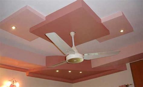 The nicely carved borders have space for led lights for nights. Pop Ceiling Designs Ideas for Living Room - DecorChamp